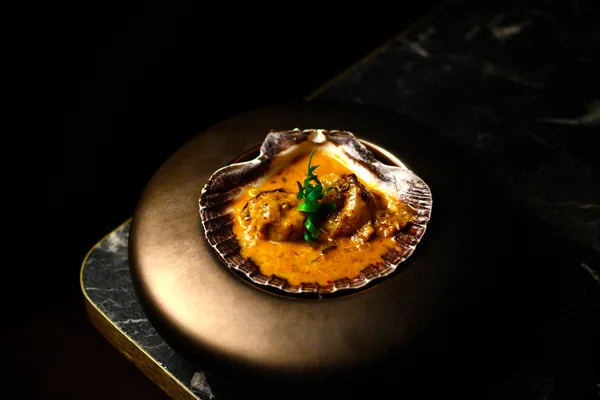 Coquille in romige kreeftensaus